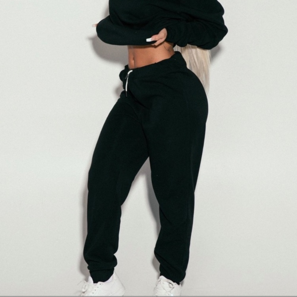 Saski black sweatpants size xs. Never worn.